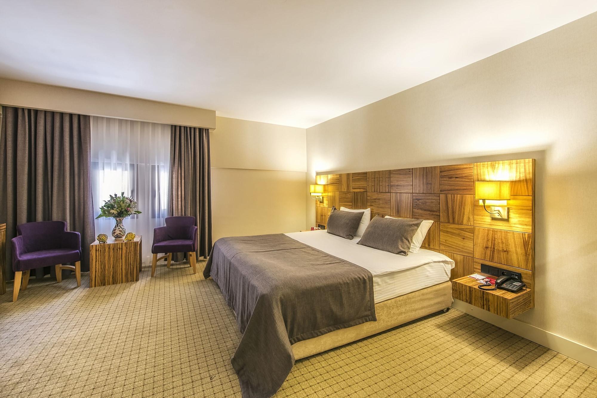 Отель Ramada By Wyndham Cappadocia Ортахисар Экстерьер фото